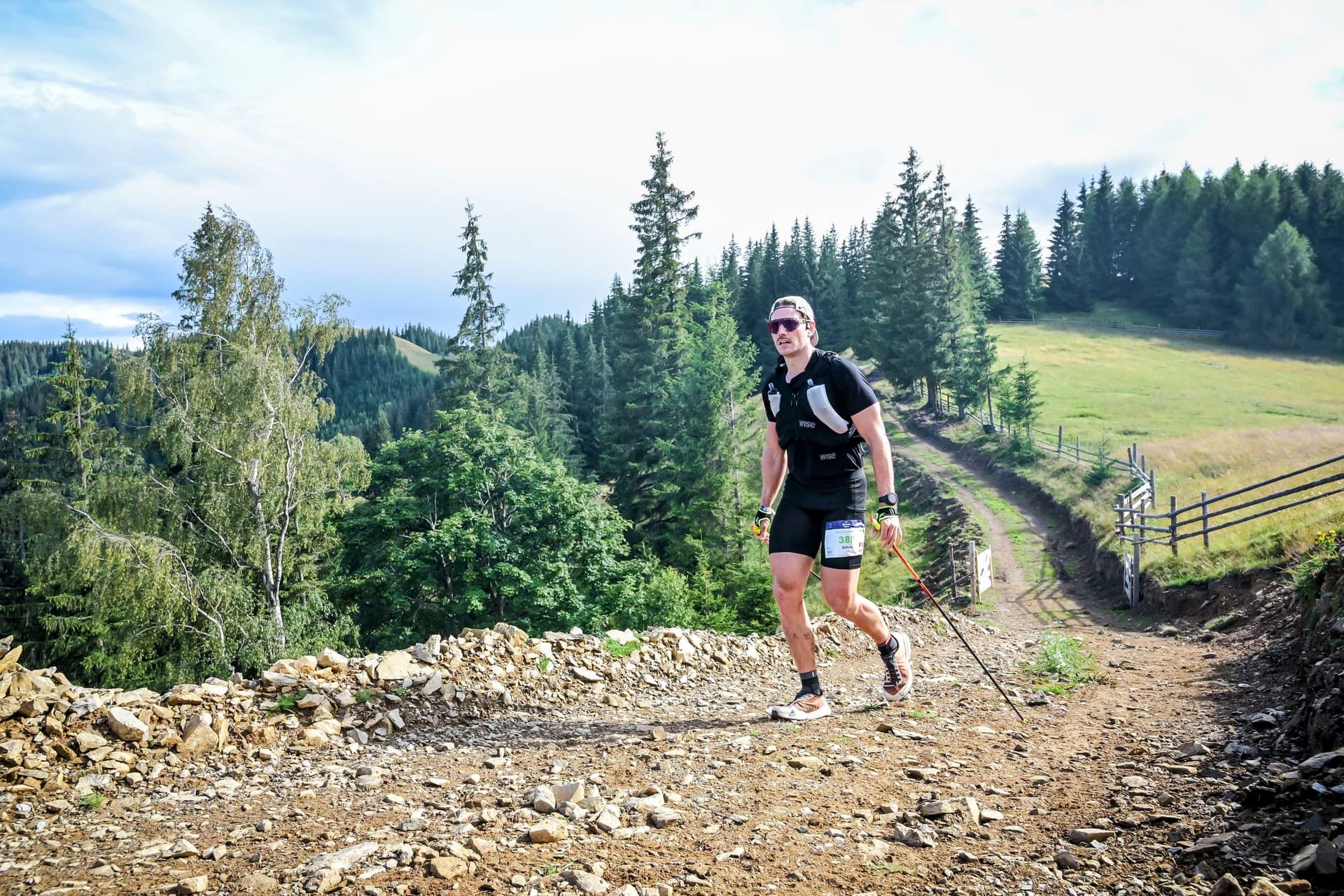 Grinding up the late-race climbs, poles in hand